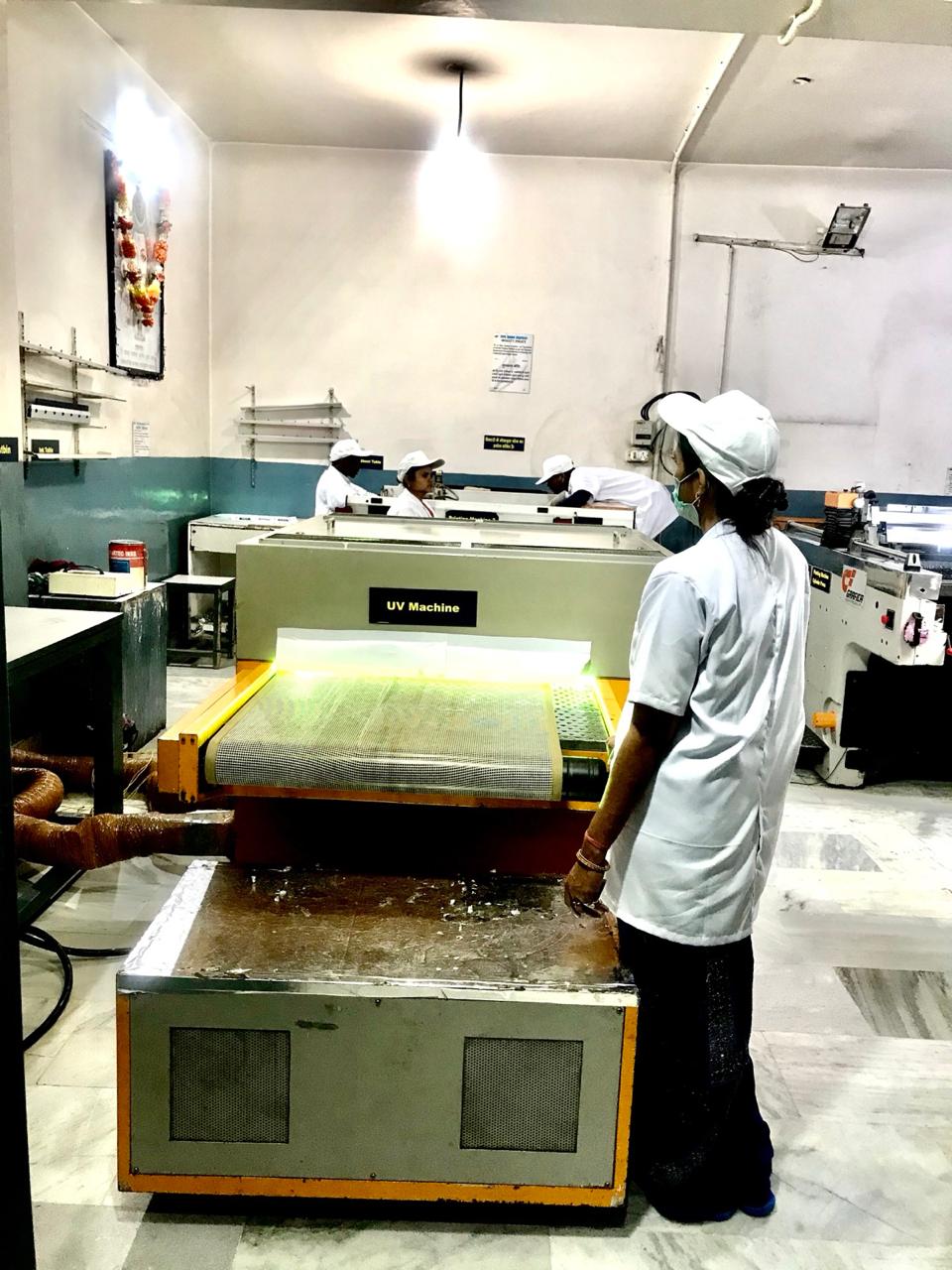 UV curing machine drying screen-printed decals